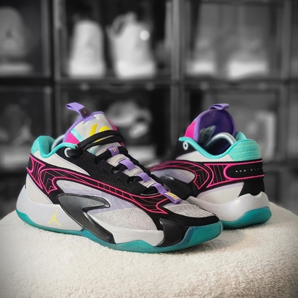Jordan Women’s Low-Top Sneakers in Black, Teal, Purple, Pink